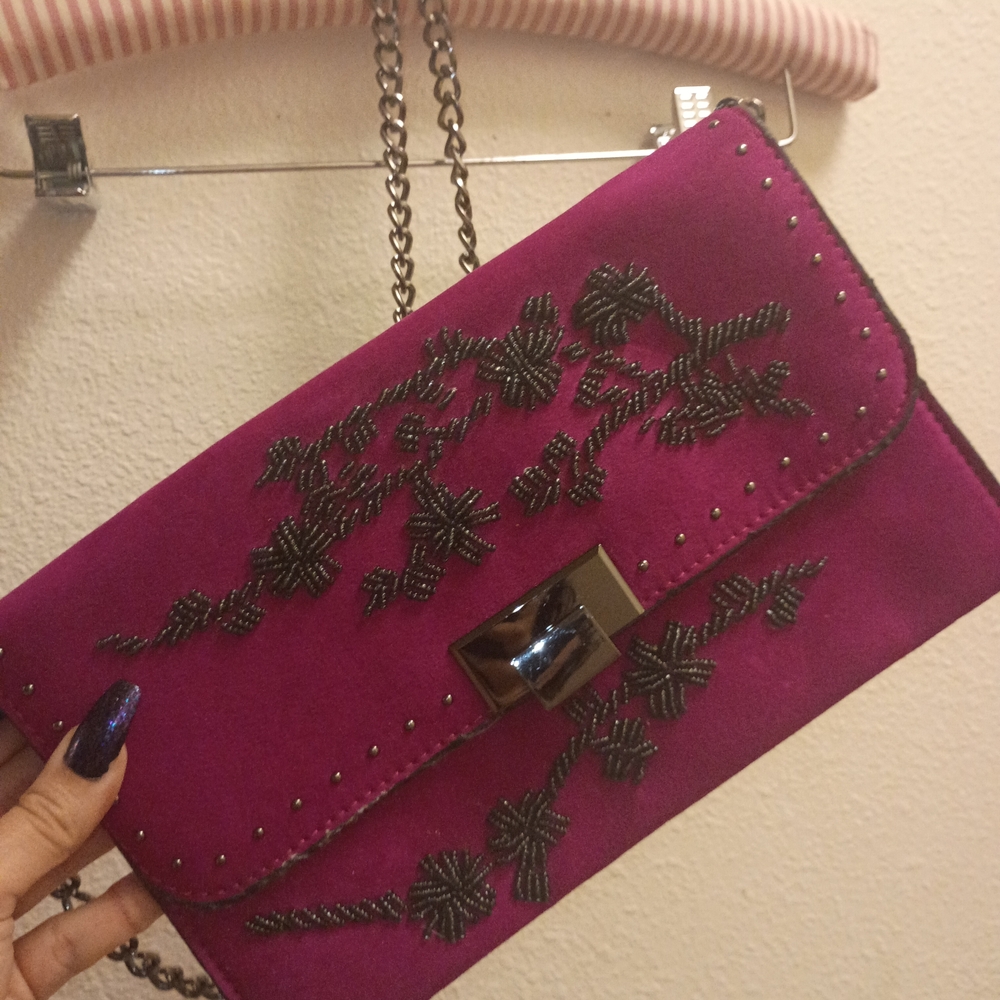 Elegant Purple Clutch with Black Embellishments